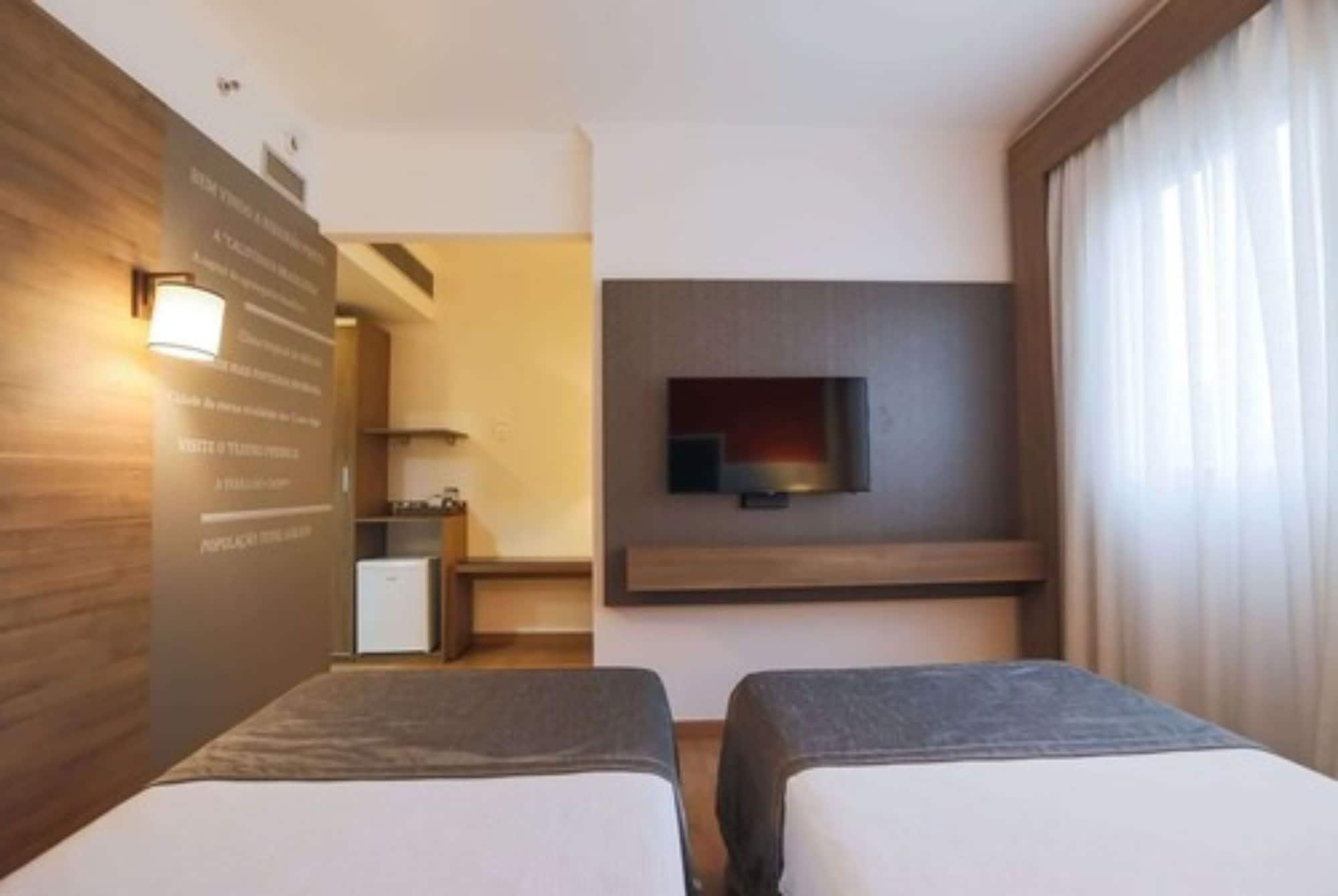 فندق Tryp By Wyndham ريبيراو بريتو المظهر الخارجي الصورة A typical room at the hotel