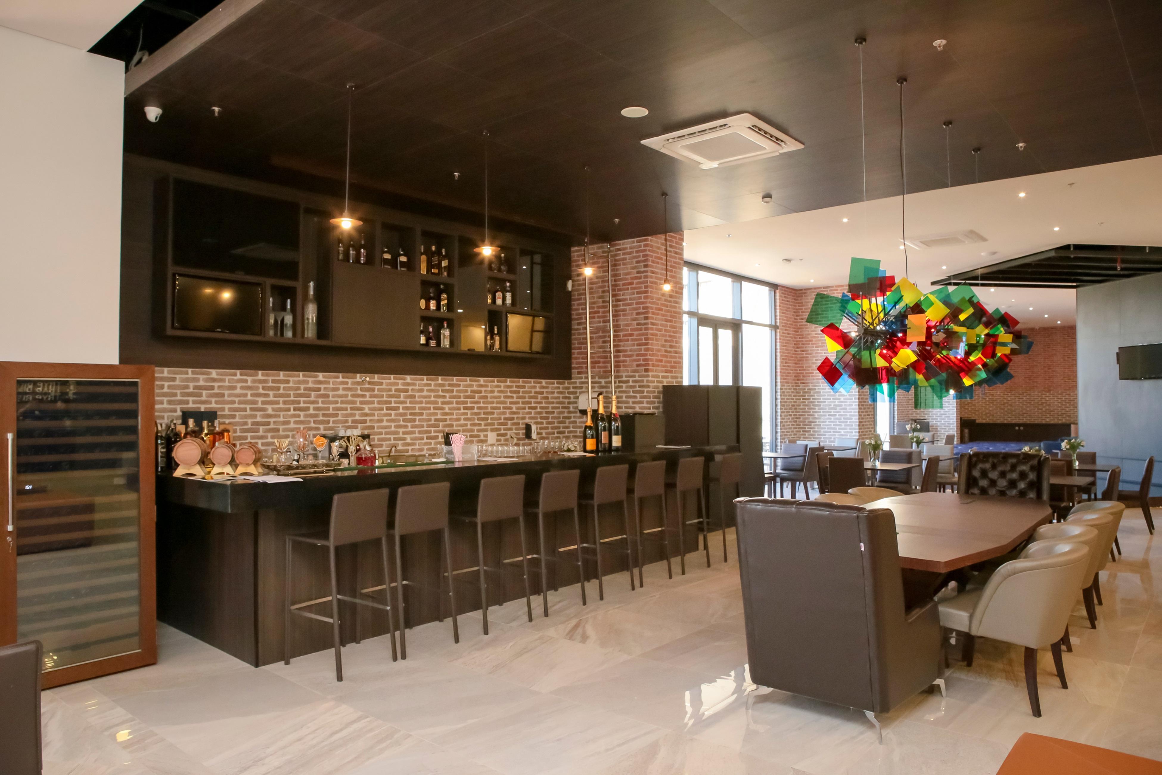 فندق Tryp By Wyndham ريبيراو بريتو المظهر الخارجي الصورة The interior of the restaurant
