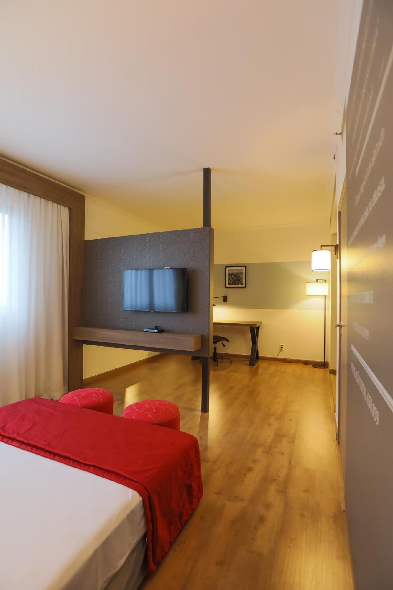 فندق Tryp By Wyndham ريبيراو بريتو المظهر الخارجي الصورة A typical room at the hotel